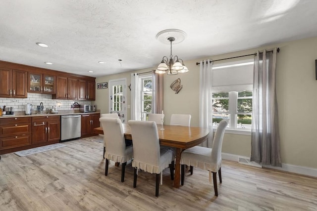 35 Pilgrim Dr, Norwood, MA 02062 - dining area with plenty of natural light, light wood-style flooring, a chandelier, and recessed lighting