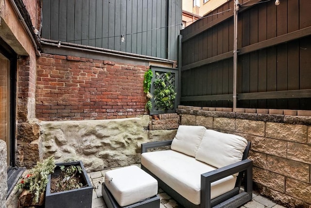 view of patio / terrace with fence