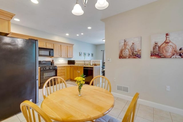 dining space with light tile patterned floors, recessed lighting, and baseboards