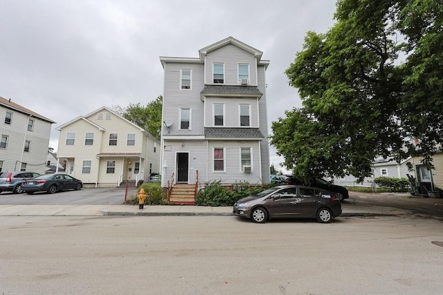 37 Colton St, Worcester, MA 01610 - view of property featuring a shingled roof