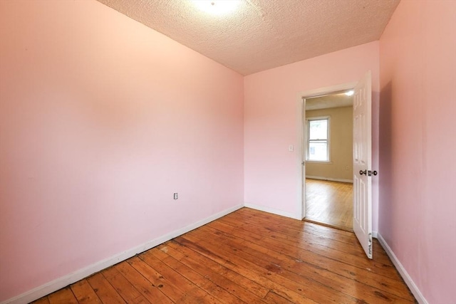 37 Colton St, Worcester, MA 01610 - unfurnished room with light wood finished floors and a textured ceiling
