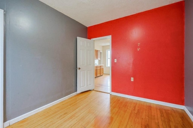 37 Colton St, Worcester, MA 01610 - empty room featuring light wood-type flooring
