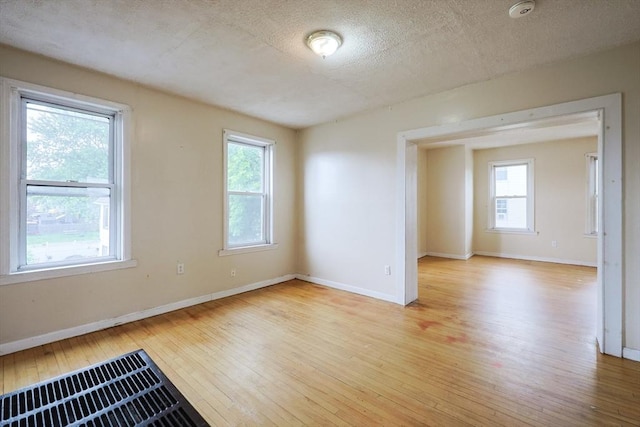 37 Colton St, Worcester, MA 01610 - unfurnished room featuring light wood finished floors and a textured ceiling