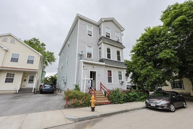 37 Colton St, Worcester, MA 01610 - view of property with roof with shingles and entry steps