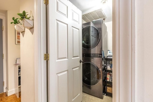 416 Commonwealth Ave Unit 212, Boston, MA 02115 - laundry room featuring stacked washing machine and dryer