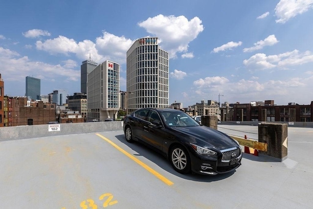 416 Commonwealth Ave Unit 212, Boston, MA 02115 - uncovered parking lot with a view of city