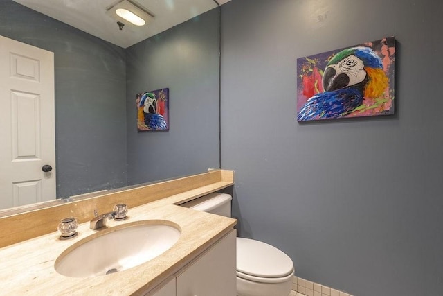416 Commonwealth Ave Unit 212, Boston, MA 02115 - half bathroom with toilet, vanity, and tile patterned floors