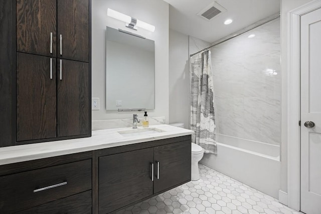 bathroom featuring toilet, vanity, visible vents, and shower / bathtub combination with curtain