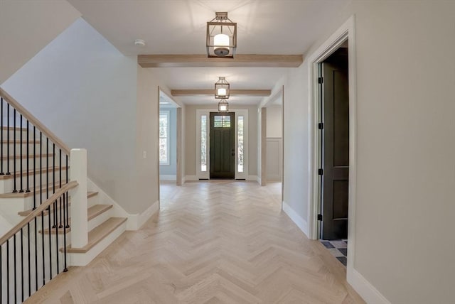 entrance foyer with light parquet floors