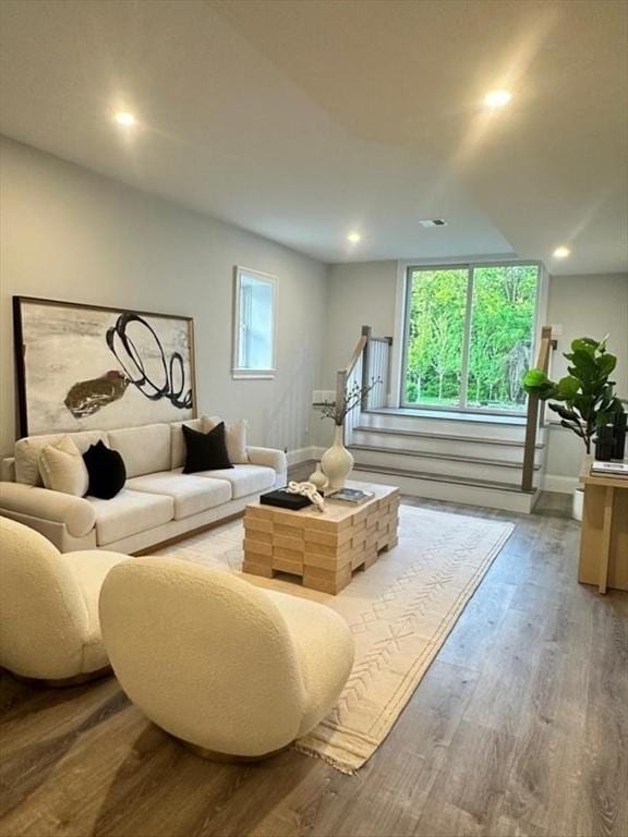 67 Pine St Unit 2, Dedham, MA 02026 - living area with baseboards, wood finished floors, and recessed lighting