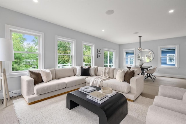 67 Pine St Unit 2, Dedham, MA 02026 - living room featuring baseboards, recessed lighting, and light wood finished floors