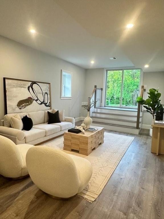 67 Pine St Unit 2, Dedham, MA 02026 - living area with baseboards, wood finished floors, and recessed lighting