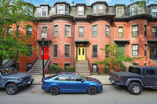 80 E Brookline St Unit 1, Boston, MA 02118 - view of front of home with mansard roof and brick siding