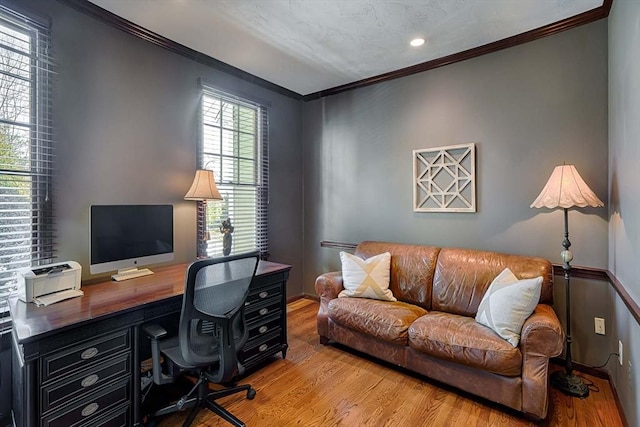 office space featuring crown molding and wood finished floors