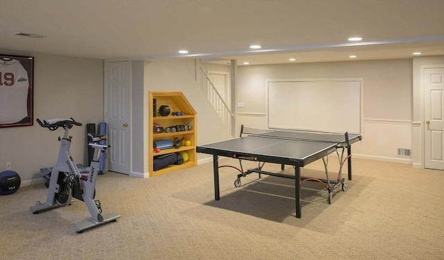 game room with recessed lighting, visible vents, baseboards, and light carpet