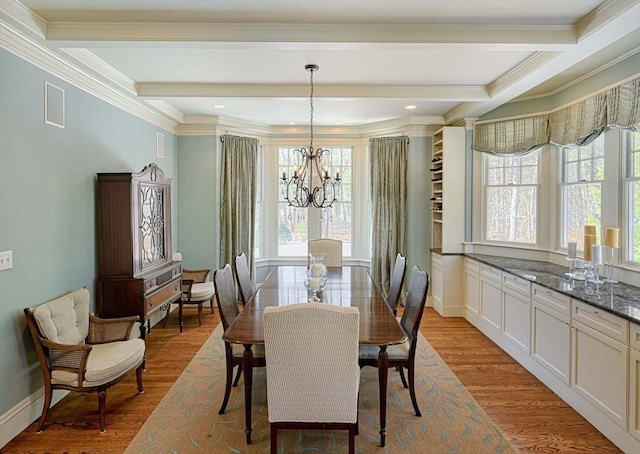 dining space with beamed ceiling, visible vents, a notable chandelier, light wood-style floors, and baseboards