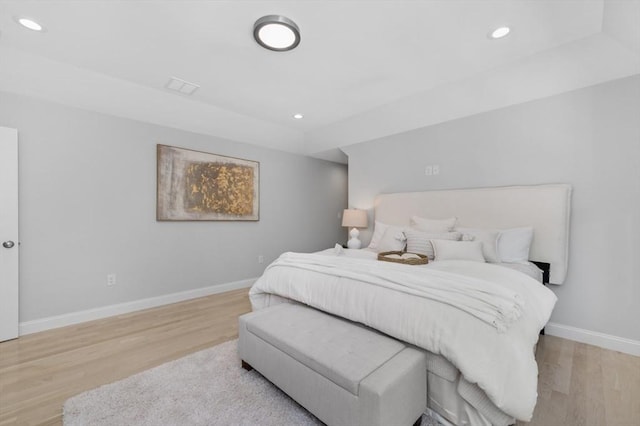 bedroom with light wood-type flooring