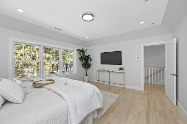 bedroom with light hardwood / wood-style floors