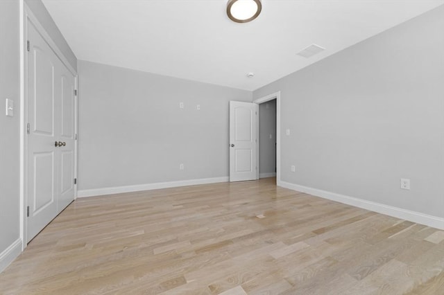 unfurnished bedroom with light hardwood / wood-style floors