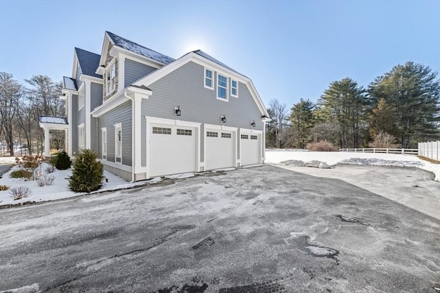 view of home's exterior featuring a garage