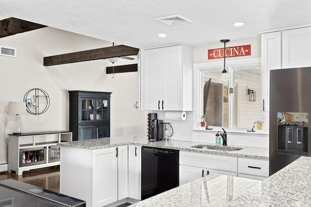 kitchen with visible vents, a sink, black dishwasher, stainless steel refrigerator with ice dispenser, and white cabinetry