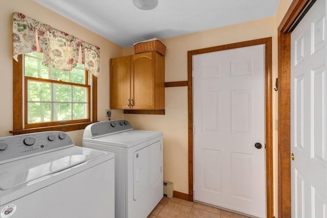 344 Mayfair Rd, Dennis, MA 02660 - laundry area featuring washer and clothes dryer, cabinet space, light tile patterned floors, and baseboard heating