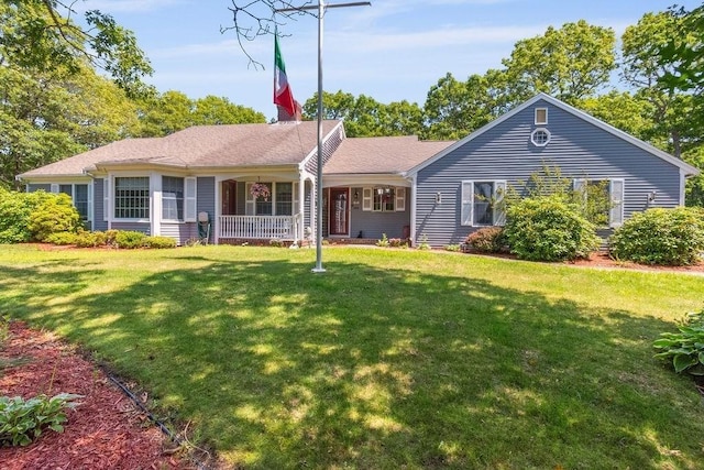 344 Mayfair Rd, Dennis, MA 02660 - ranch-style house with a porch and a front lawn