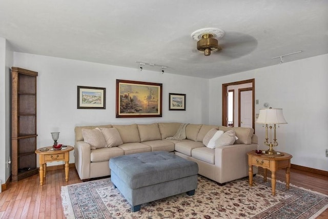 344 Mayfair Rd, Dennis, MA 02660 - living room with hardwood / wood-style flooring, a ceiling fan, and rail lighting