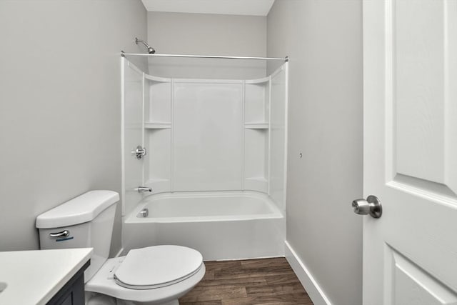 full bathroom with vanity, wood-type flooring,  shower combination, and toilet