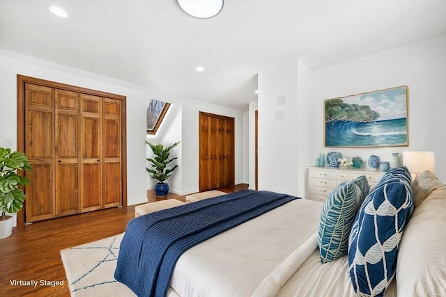 bedroom featuring wood finished floors and recessed lighting