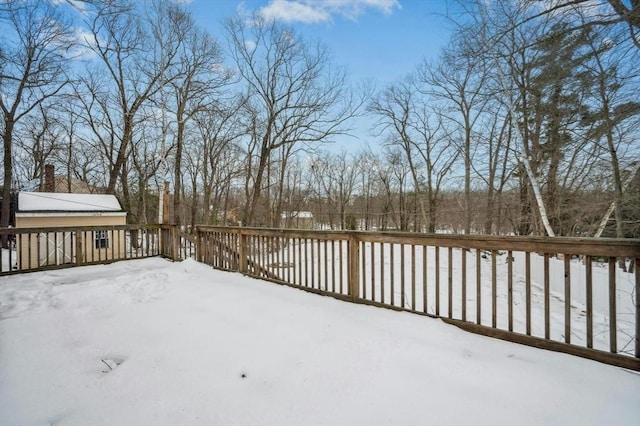 view of snow covered deck