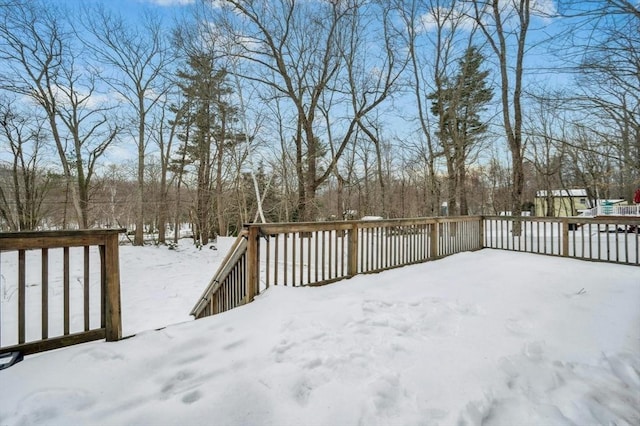 view of snow covered deck