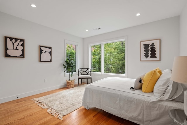 bedroom featuring wood-type flooring