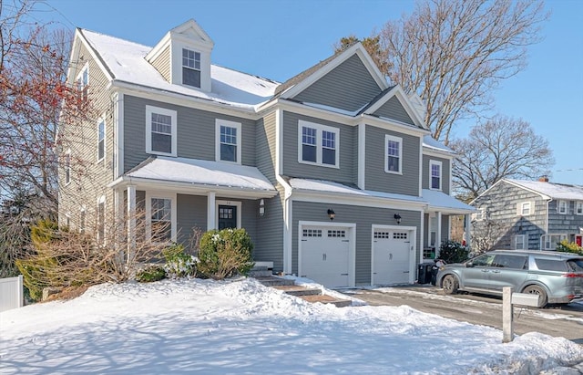 view of front of home with a garage