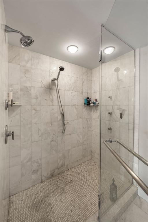bathroom with a stall shower