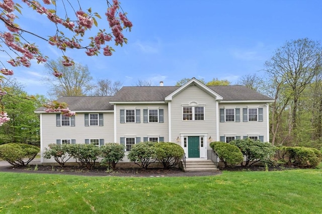 view of front facade with a front lawn