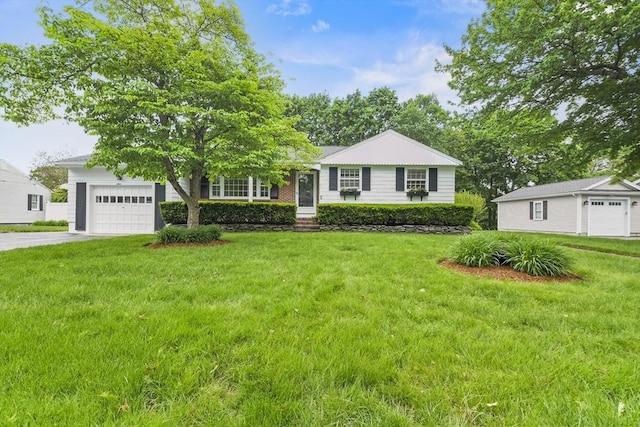 9 Divittorio Dr, Milford, MA 01757 - view of front of property featuring an attached garage, a front lawn, and concrete driveway