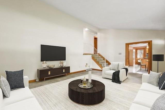 9 Divittorio Dr, Milford, MA 01757 - living room featuring stairs and baseboards