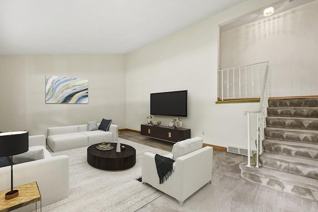 9 Divittorio Dr, Milford, MA 01757 - living area with stairs, baseboards, and carpet floors
