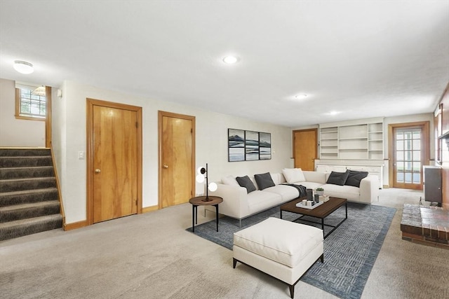 9 Divittorio Dr, Milford, MA 01757 - carpeted living area featuring stairway, recessed lighting, built in features, and baseboards