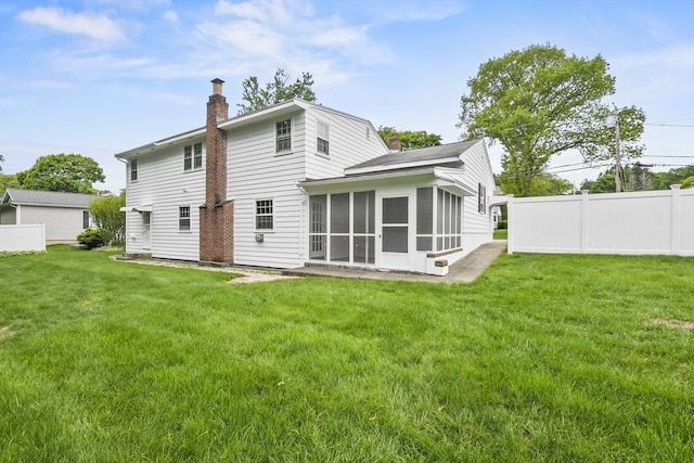 9 Divittorio Dr, Milford, MA 01757 - rear view of property featuring a chimney and a sunroom