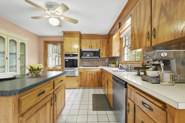 9 Divittorio Dr, Milford, MA 01757 - kitchen featuring appliances with stainless steel finishes, a warming drawer, a sink, tasteful backsplash, and ceiling fan