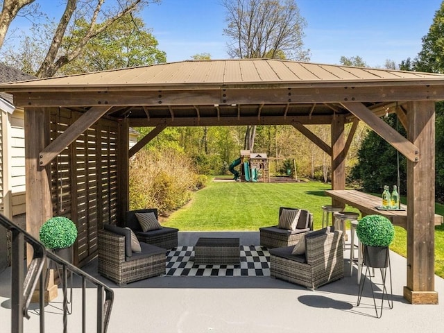 view of patio / terrace with a playground, a gazebo, and outdoor lounge area
