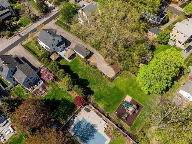 birds eye view of property with a residential view