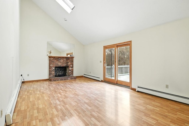 unfurnished living room featuring high vaulted ceiling, a baseboard heating unit, a skylight, and wood finished floors