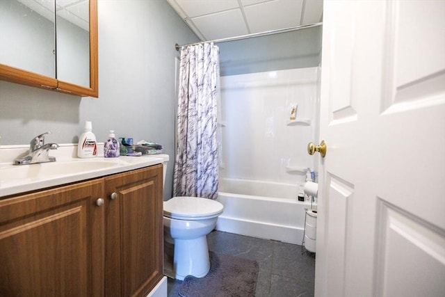 full bathroom with toilet, vanity, shower / bath combo, tile patterned flooring, and a drop ceiling