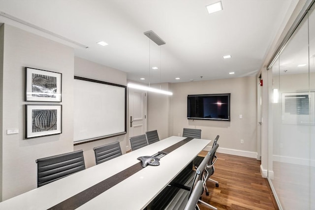 home theater featuring hardwood / wood-style floors