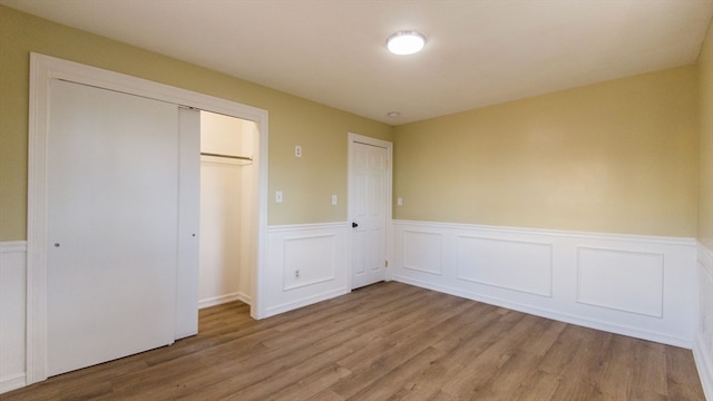 unfurnished bedroom with light hardwood / wood-style floors