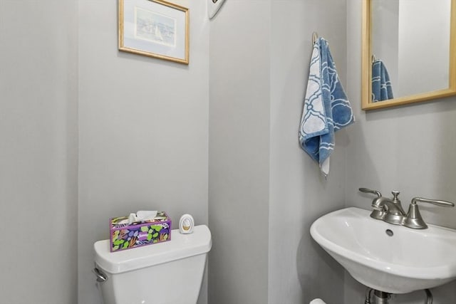 bathroom with a sink and toilet