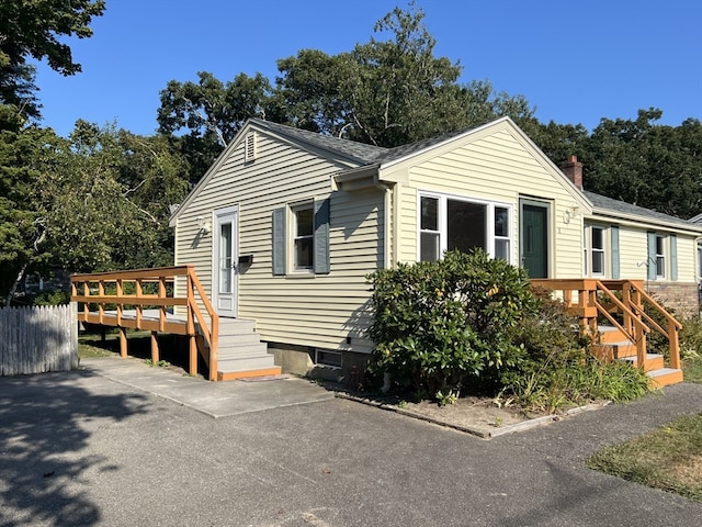 view of front of property with a deck